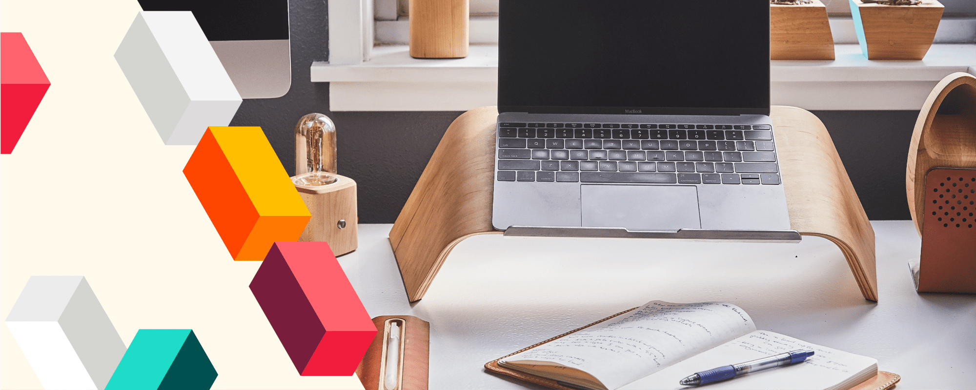 Decorative blocks on beige background. Image of an Apple laptop and notebook with pen. PathFactory logo on bottom left side