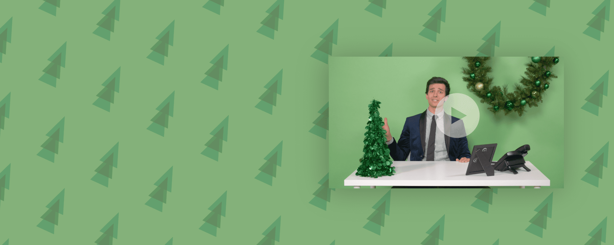 Header Image with a Green Background with cartoon patterned Christmas Trees, thumbnail for the video with a man in a suit at a desk with Christmas decorations on it.