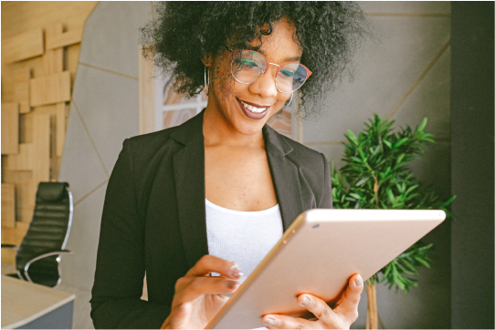 A Marketer happily working on her nurture campaigns 