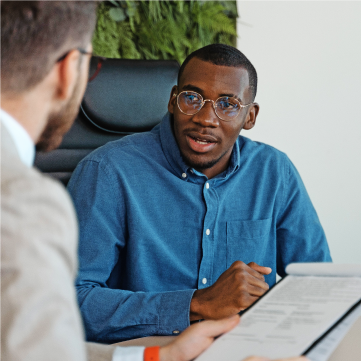 A buyer who is having a meeting with a sales representative