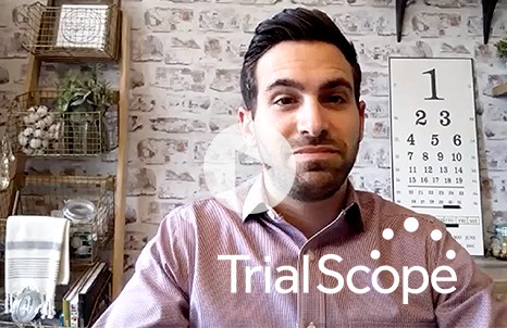 Video Thumbnail featuring TrialScope Logo and Naor Chazan smiling in front of a rustic white brick wall background